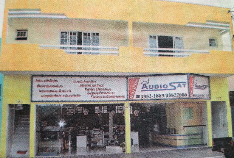 Casa e Casa de Fartura na rua Barão do Rio Branco, 242